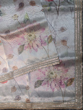 Silver Tissue Organza Saree With Floral Design And Work Lace Border