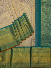 Kanjeevaram Kanchi Pattu All Over Butta Zari With Contrast Border & Edgeing (Talambralu) Cream + Green + Orange