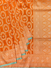Orange Banarasi Jaal Saree with Gold Zari Border