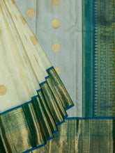 Kanjeevaram Kanchi Pattu All Over Butta Gold Zari With Contrast Border (Talambralu) Cream + Blue