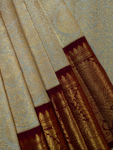 Kanjeevaram Kanchi Pattu All Over Butta Zari With Contrast Border (Talambralu) Cream + Maroon