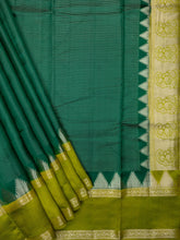 Bottle Green Chiniya Silk Saree With All Over Gold Zari And Contrast Border