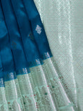 Teal Blue Chiniya Silk Saree With Silver Zari Butta & Pista Green Border