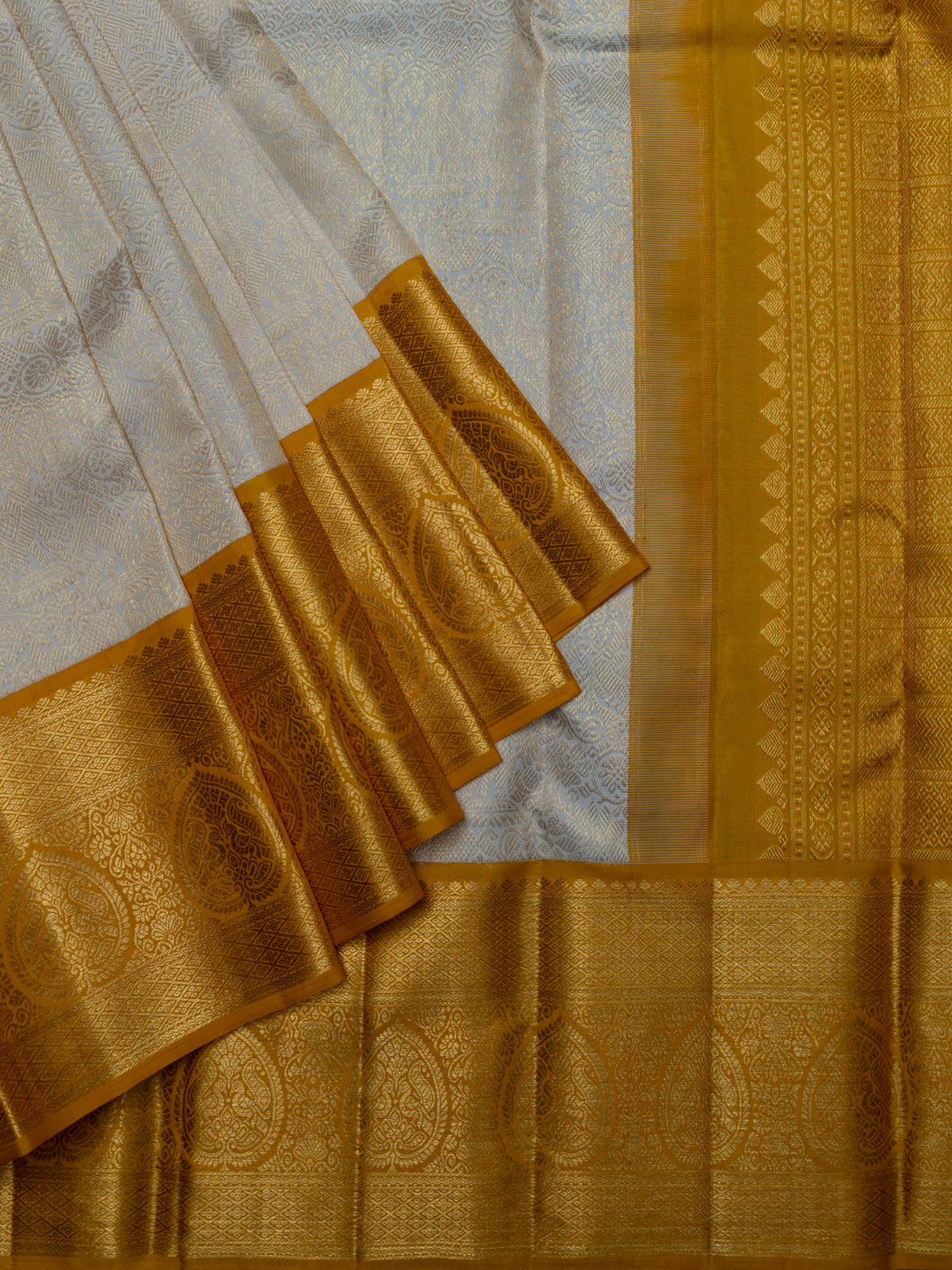 Kanjeevaram Kanchi Pattu All Over Butta Zari With Contrast Border (Talambralu) Cream + Orange