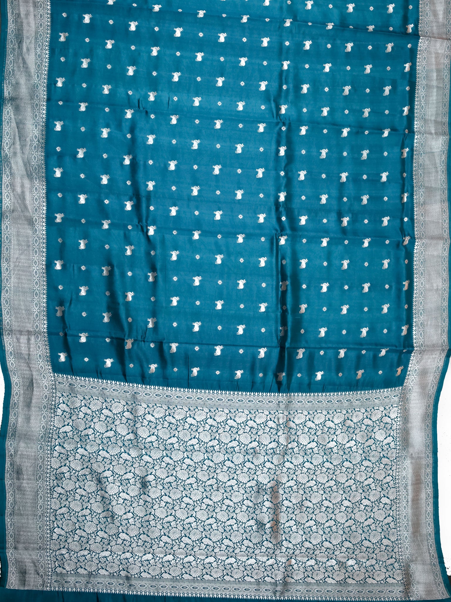 Teal Blue Chiniya Silk Saree With Pichwai Butta Design And Self Gold Zari