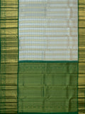 Kanjeevaram Kanchi Pattu All Over Butta Gold & Silver Zari With Contrast Border (Talambralu) White + Green
