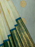 Kanjeevaram Kanchi Pattu All Over Butta Gold Zari With Contrast Border (Talambralu) Cream + Blue
