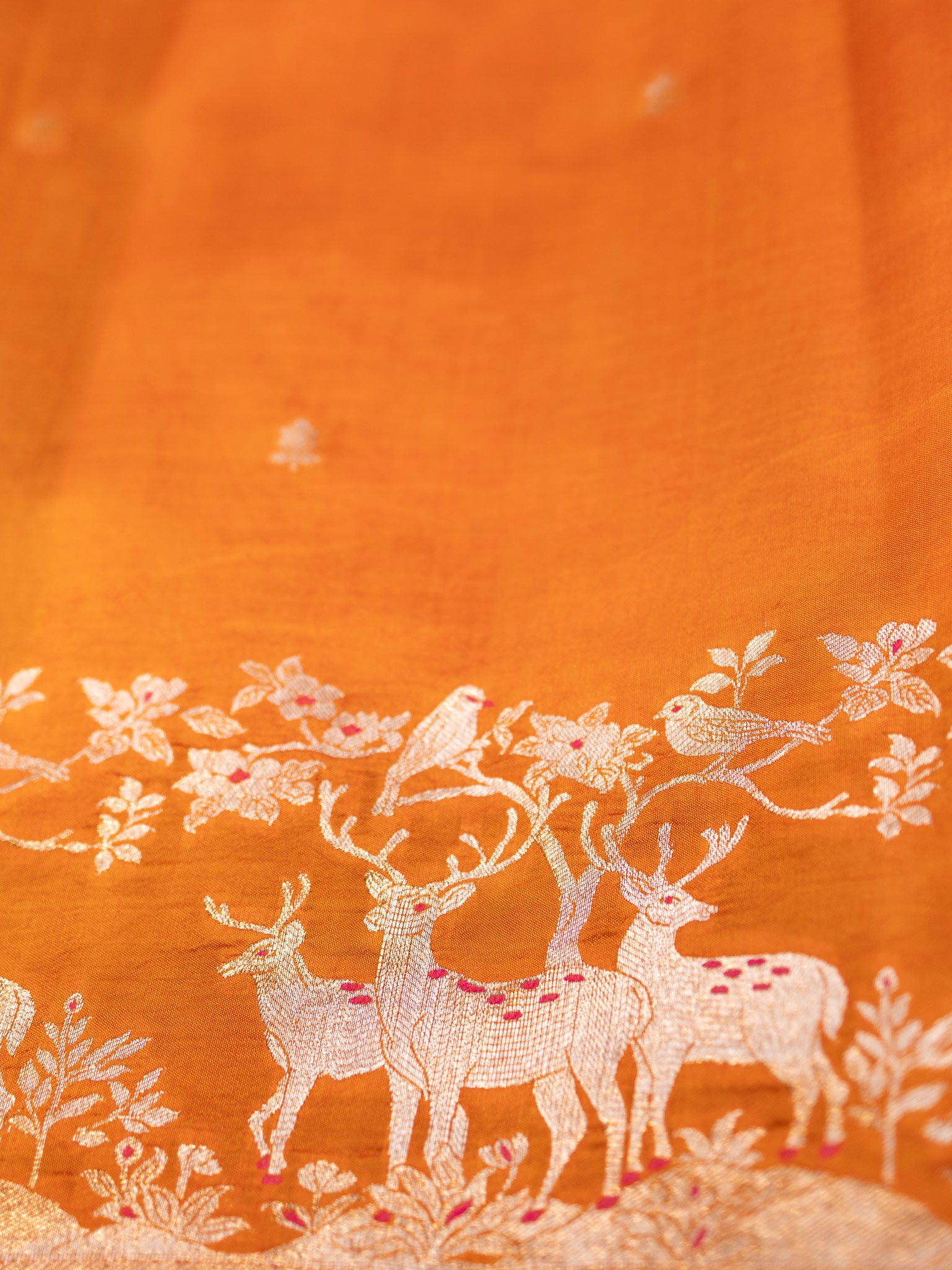 Orange Chiniya Silk Saree With Small Butta Deer Border And Self Gold Zari