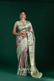 Champagne Pink Pista Green Kanchi Pattu Saree with Gold Zari